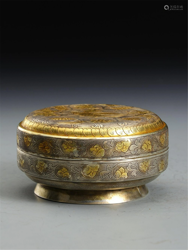 A GILT ALLOY COPPER CIRCULAR BOX AND COVER