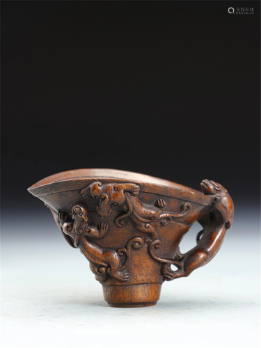 A CHENXIANG WOOD CARVED CHI-DRAGONS JUE CUP