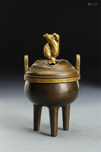 A GILT BRONZE INCENSE BURNER WITH FROG CENSER TOP