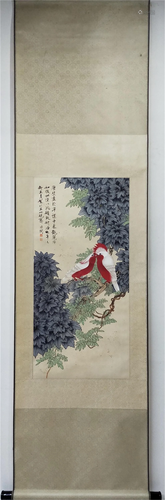 A CHINESE PAINTING OF TWO PARROTS