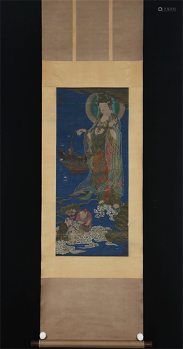 A CHINESE PAINTING OF AVALOKITESVARA WITH FISH BASKET