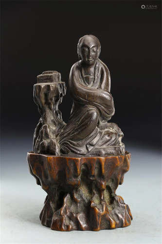 A CHENXIANG WOOD CARVED SEATED AVALOKITESVARA