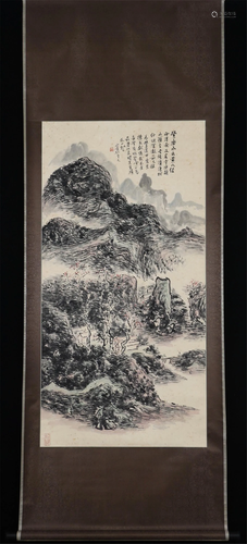 A CHINESE PAINTING OF MOUNTAINS