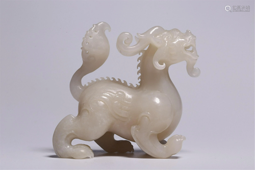 A WHITE JADE CARVED CHI-DRAGON DECORATION