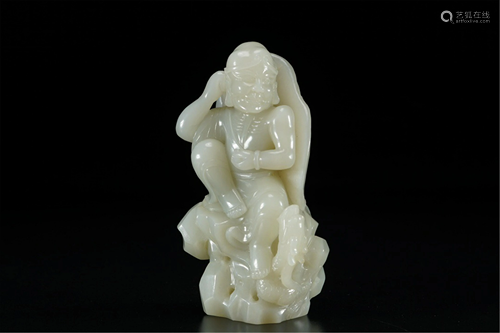 A WHITE JADE CARVING OF ARHAT NANTIMITOLO