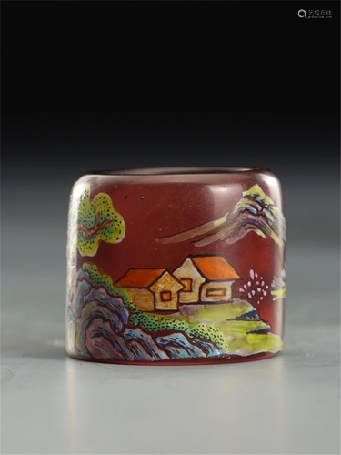 A POLYCHROME PAINTED GLASS THUMB RING