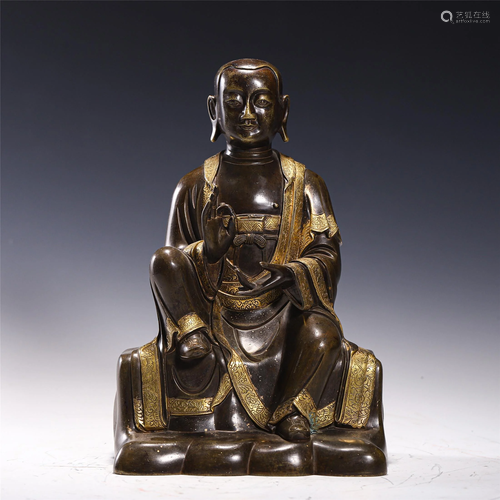 A TIBETAN GILT BRONZE BUDDHA STATUETTE