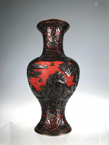 A CARVED LACQUER LANDSCAPE VASE