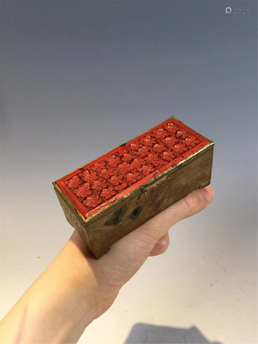 A CARVED RED LACQUER BRONZE INCISED STAMPS BOX