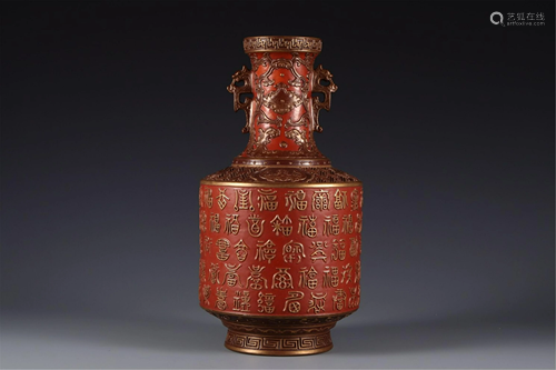 AN IRON-RED GLAZE GOLD-PAINTED DOUBLE HANDLES VASE