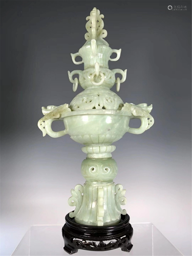 A HOLLOW CARVED JADE INCENSE BURNER