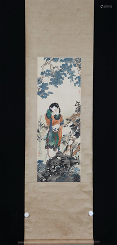 A CHINESE PAINTING OF BEAUTY UNDER THE TREE