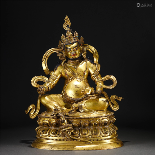 A BRONZE GILT YELLOW JAMBHALA