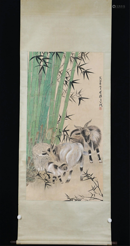 A CHINESE PAINTING OF THREE GOATS AND BAMBOOS