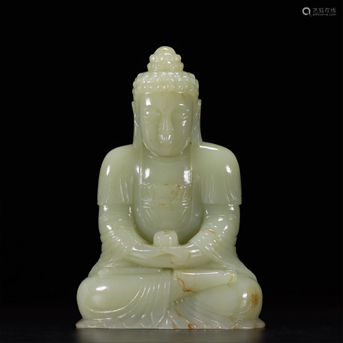 A JADE CARVED SEATED SAKYAMUNI