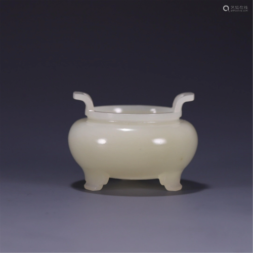 A JADE TRIPOD INCENSE BURNER WITH DOUBLE HANDLES