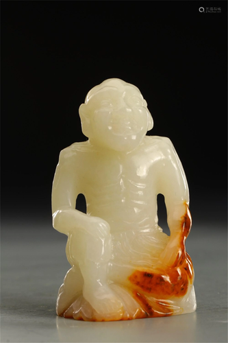 A JADE CARVED FIGURINE OF ARHAT