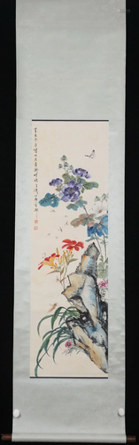 A CHINESE PAINTING OF FLOWERS AND INSECTS