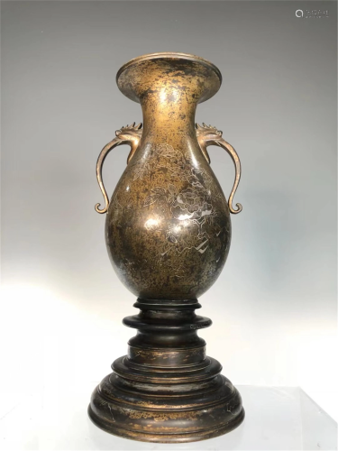 A SILVER-WIRE INLAID BRONZE VASE WITH DOUBLE HANDLES