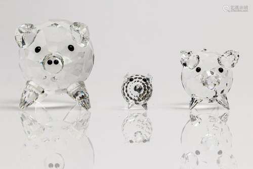 Three graduated Swarovski Crystal Pigs,