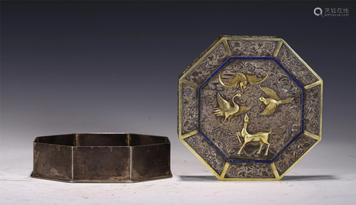 A GILT SILVER OCTAGONAL BOX AND COVER