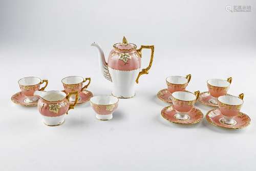 A Royal Crown Derby Vine pattern coffee set in pink and gold...