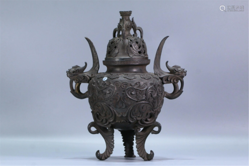 A BRONZE TRIPOD INCENSE BURNER WITH DOUBLE HANDLES