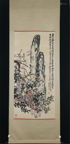 A CHINESE PAINTING OF WISTERIA AND ROCK