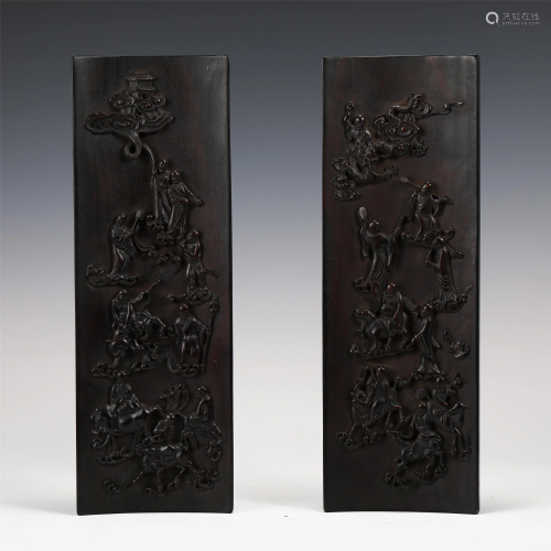 PAIR OF CARVED FIGURES STORY HARDWOOD PLAQUES
