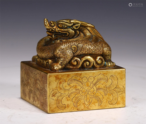 A GILT BRONZE DRAGON SEAL