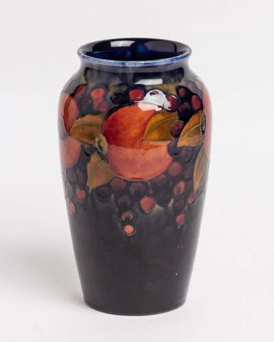 A Moorcroft Pomegranate pattern vase, 10 1/2 x 5 3/4 in. (26...