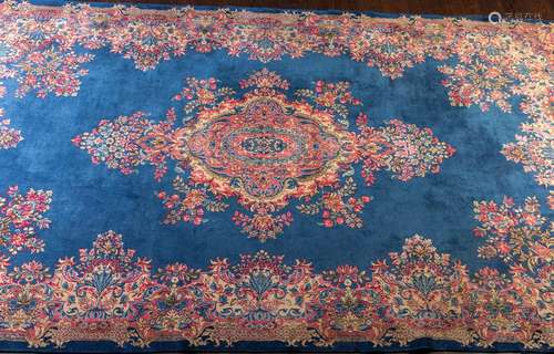 A large Kerman hand knotted wool carpet, 8'11" x 1...