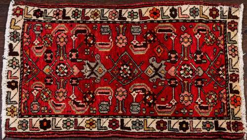 A small Persian hand knotted wool mat, 1'10 1/2" x...