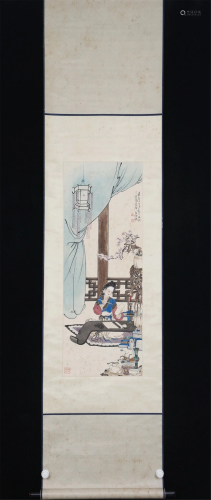 A CHINESE PAINTING OF READING BY THE LAMPLIGHT