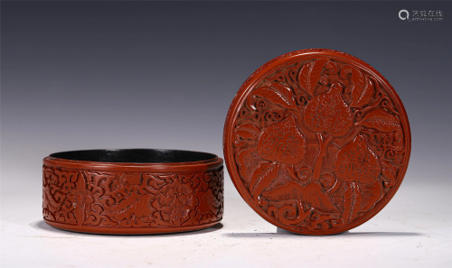 A CARVED RED LACQUER CIRCULAR BOX AND COVER