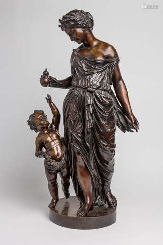 A bronze figure group depicting the Goddess Demeter with a p...