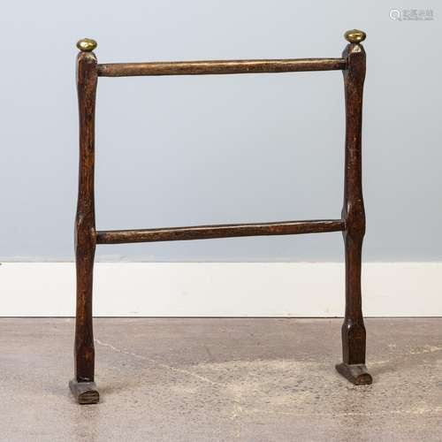 An antique oak towel rack, 32 1/2 x 26 in. (82.5 x 66 cm)