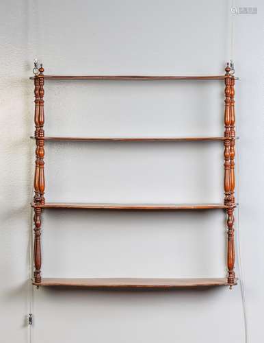 A 19th century mahogany hanging wall shelf.