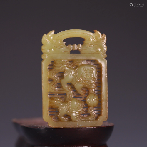 A YELLOW JADE CARVED PLAQUE PENDANT