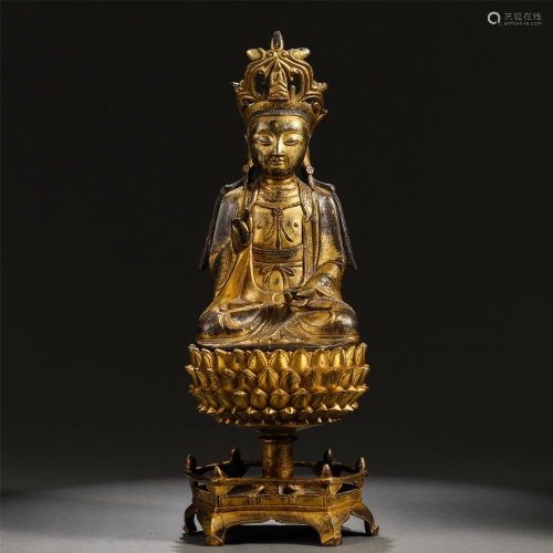 A GILT BRONZE SEATED AVALOKITESVARA