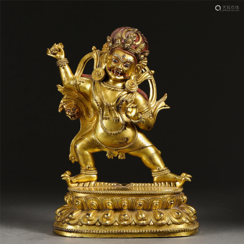 A GILT BRONZE BUDDHA STATUETTE