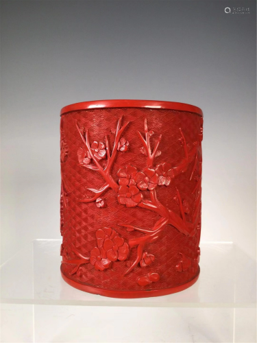 A CARVED RED LACQUER FLORAL BRUSH POT