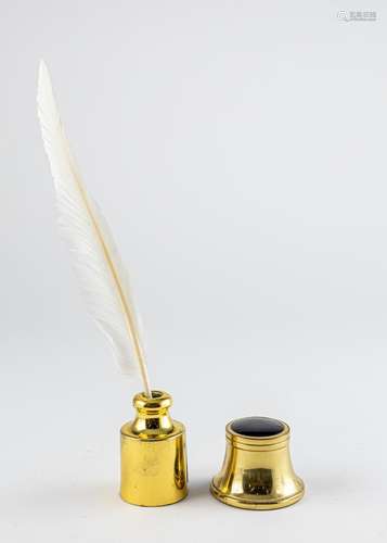 A brass bottle inkwell with feather pen, 3 x 2 in. (7.5 x 5 ...