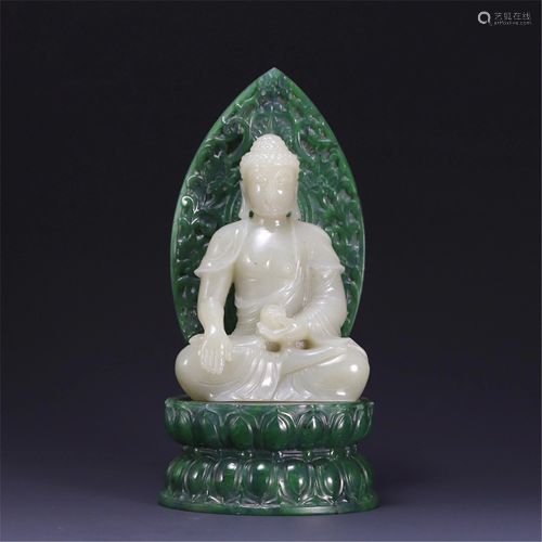 A WHITE JADE CARVED SEATED SAKYAMUNI