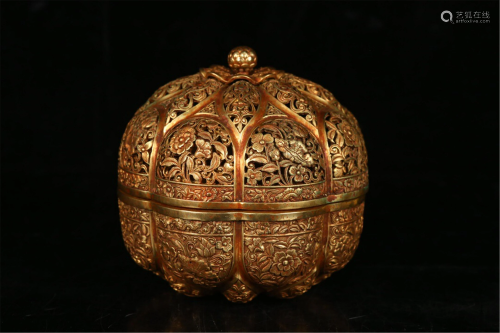 A LOBED GILT BRONZE FLORAL BOX AND COVER