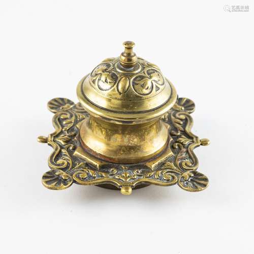 A Victorian embossed brass inkstand of square form,