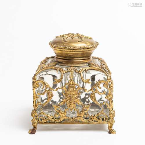 A gilt brass mounted glass table inkwell. 4 1/4 in. (11 cm) ...