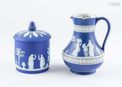 A Wedgwood blue jasperware biscuit barrel and cover and a pi...