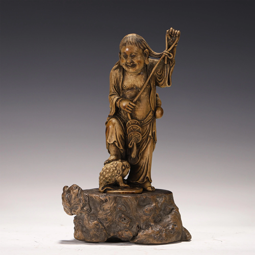 A CHENXIANG WOOD CARVED FIGURAL DECORATION