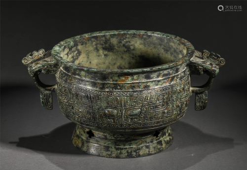 A BRONZE INCENSE BURNER WITH DOUBLE HANDLES